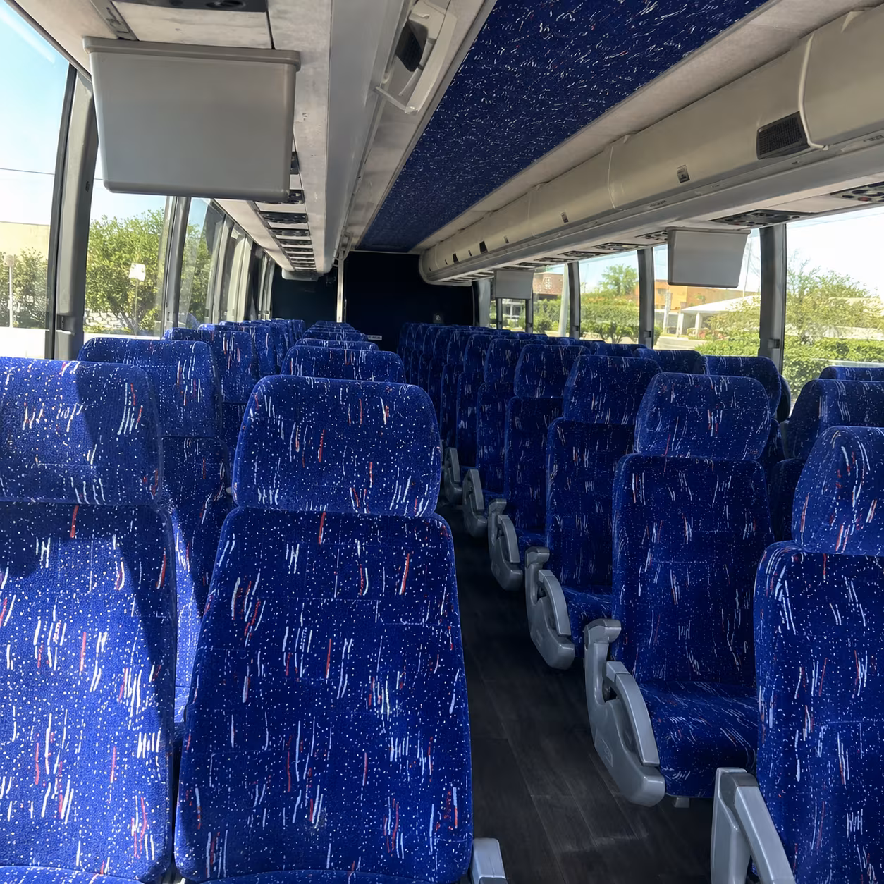 charter buses and party buses to unt mean green games at datcu stadium